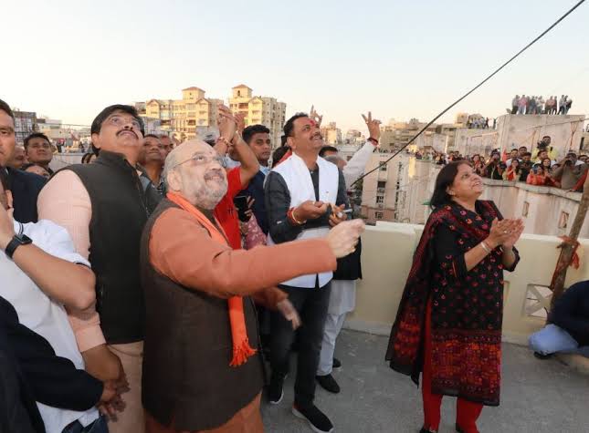 Home Minister Amit Shah tries his hand at kite flying in Ahmedabad on occasion of Makar Sankranti
