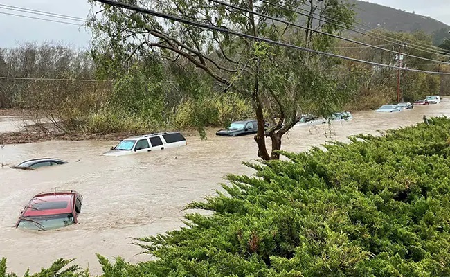 More than than 65 million at risk of flooding in California, thousands evacuate as flood water turns street into river
