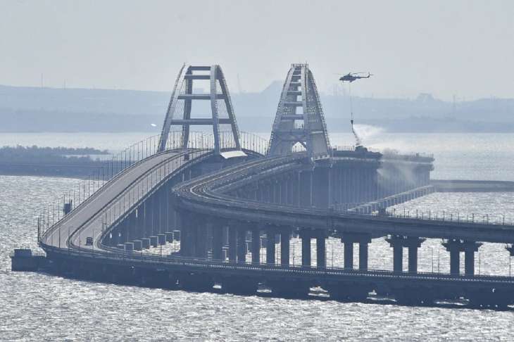 Major bridge linking Russia to Crimea closed after reports of explosion, 2 killed