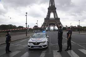 Paris police evacuated the area after receiving a threat to blow up the Eiffel Tower
