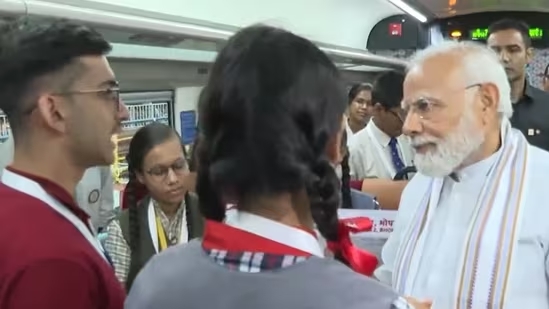 PM Modi Engages with Students and Crew on RapidX Train in Sahibabad