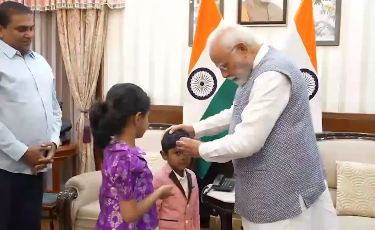 Prime Minister Narendra Modi Delights Young Visitors with Magical Coin Trick