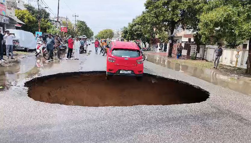 Lucknow Road Disaster: Car Dangles on Edge as Massive Sinkhole Emerges