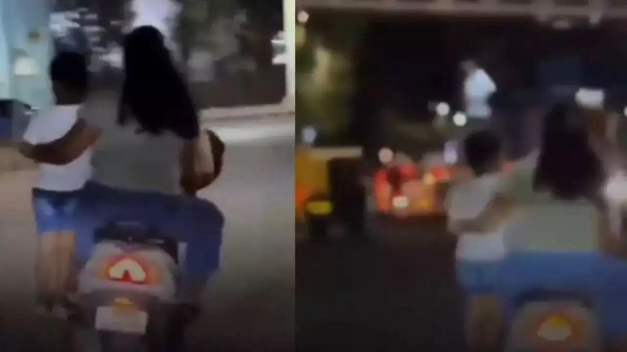 Watch: Bengaluru couple riding scooter with child standing on footrest sparks outrage