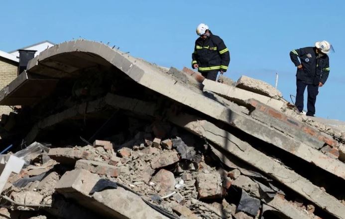 South Africa building death toll rises to 32 as crews find more bodies; 20 still missing